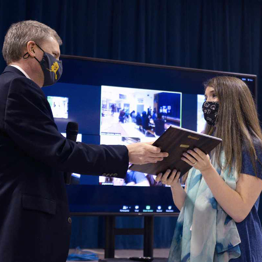 Kelly Shrein receiving an award