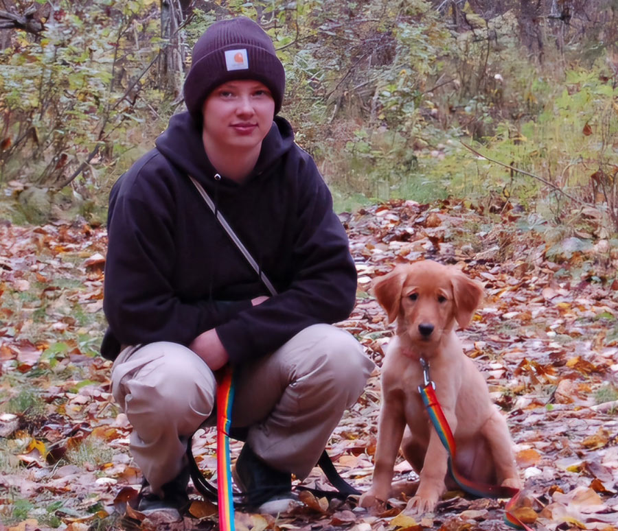 Lake Carlson posing with his dog